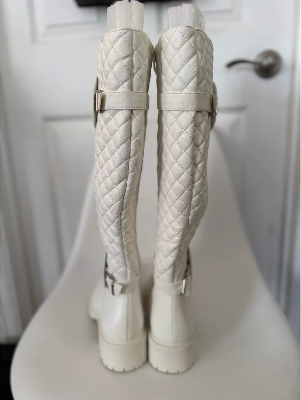 White quilted knee high boots